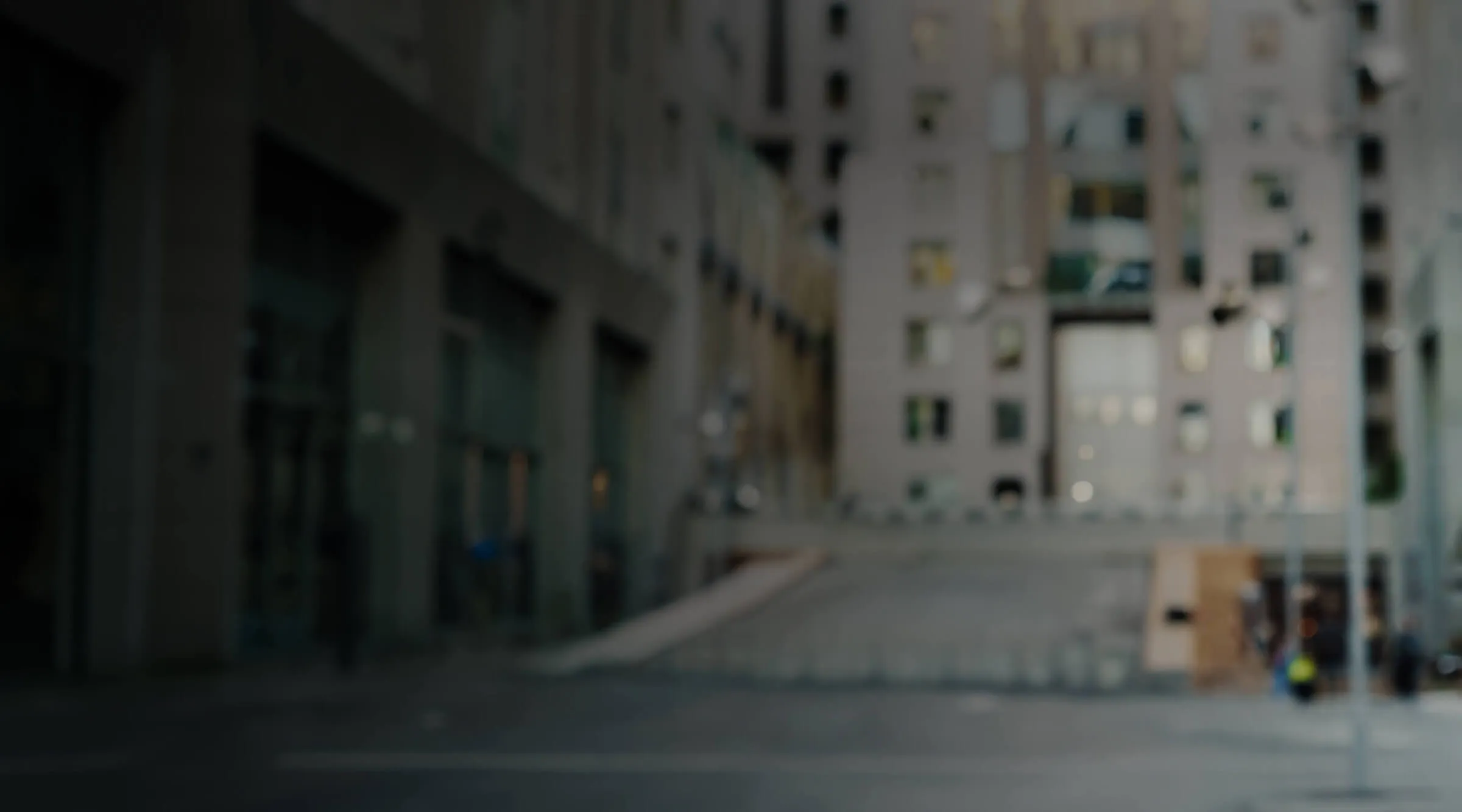 an image of a street with buildings