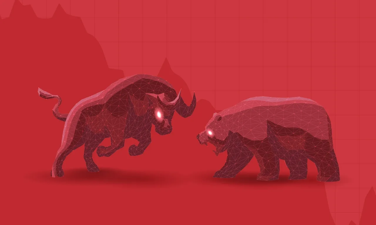 Um touro e um urso enfrentam-se num fundo vermelho, simbolizando as tendências do mercado.