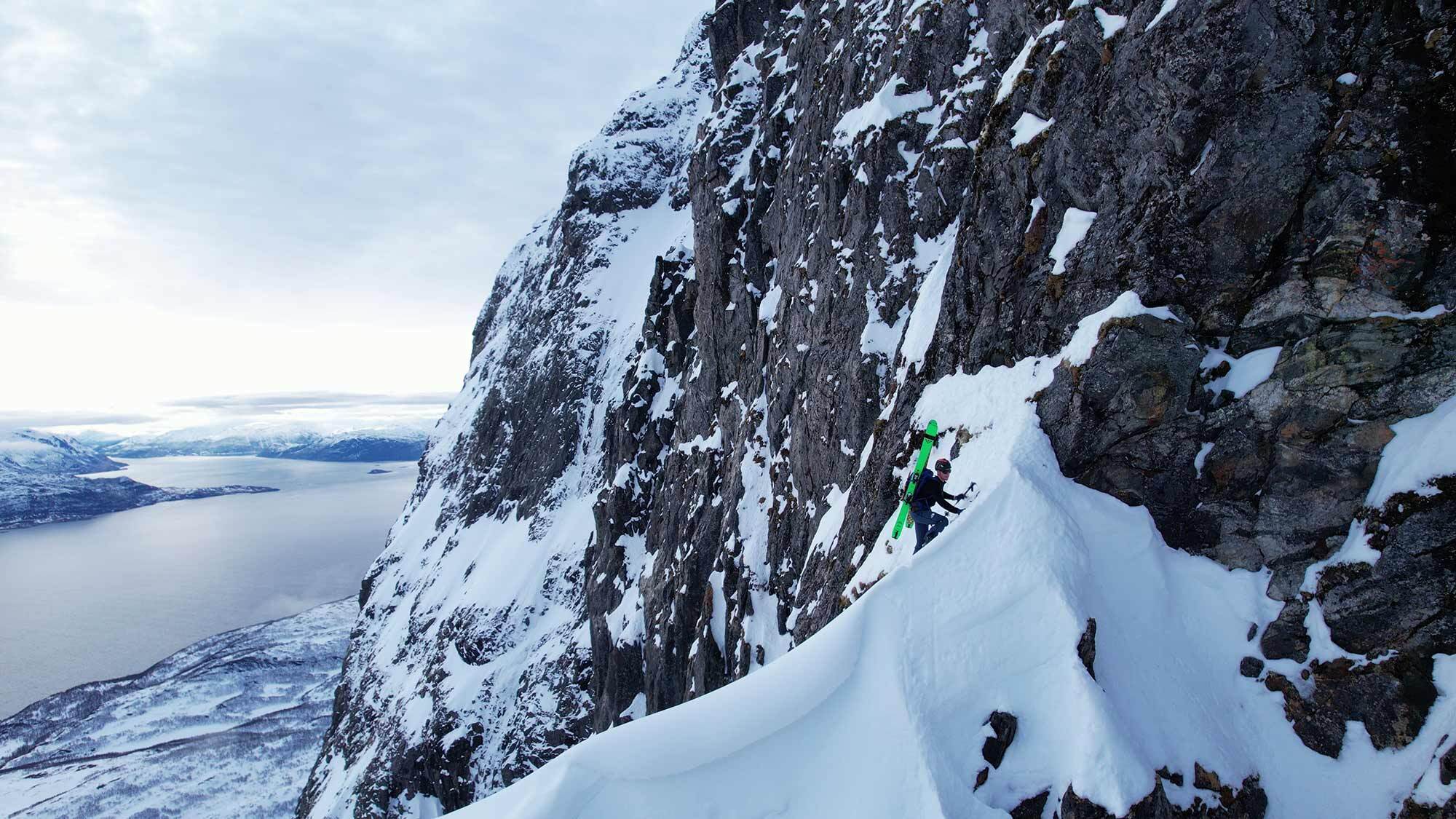 Kahuna team member climbing a mountain